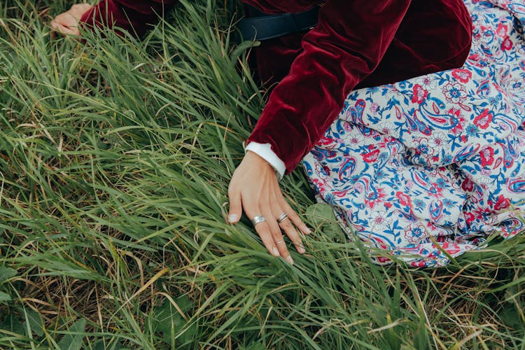 A Person Wearing Silver Wedding Rings