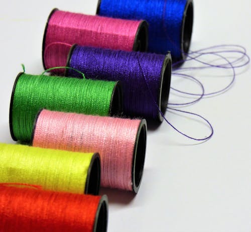 Free stock photo of bright colours, cotton reels Stock Photo