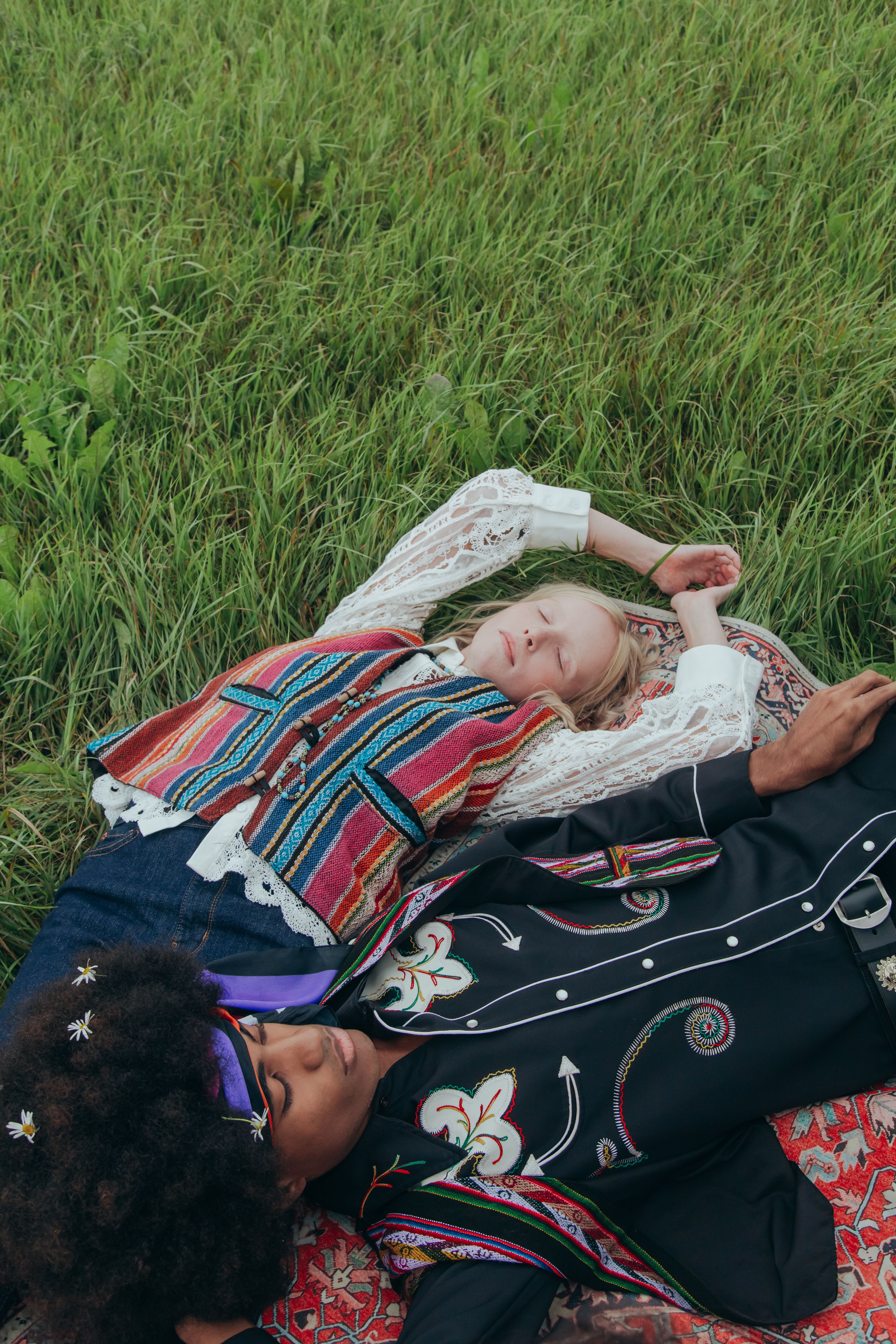 Man and Woman Lying on Grass · Free Stock Photo
