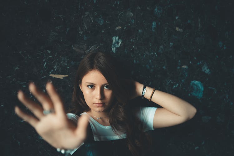 Girl Holding Up Her Hand 