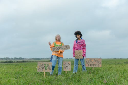 A Couple Protesting in an Open Field