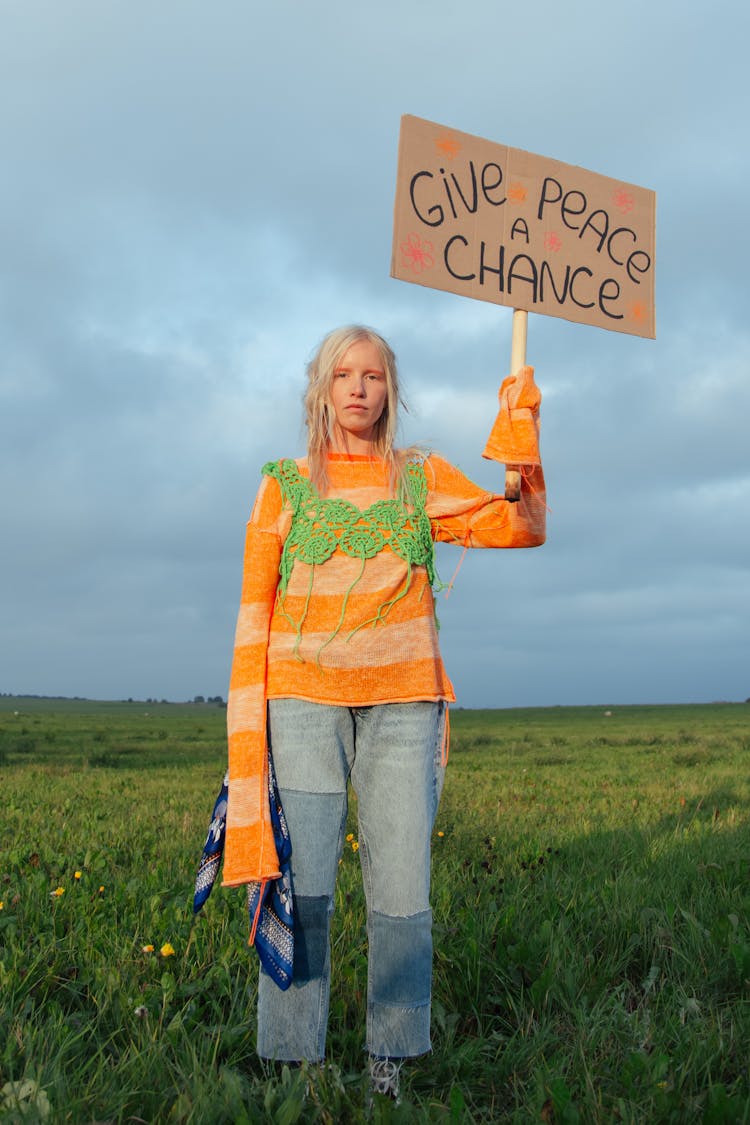 A Woman Holding A Placard