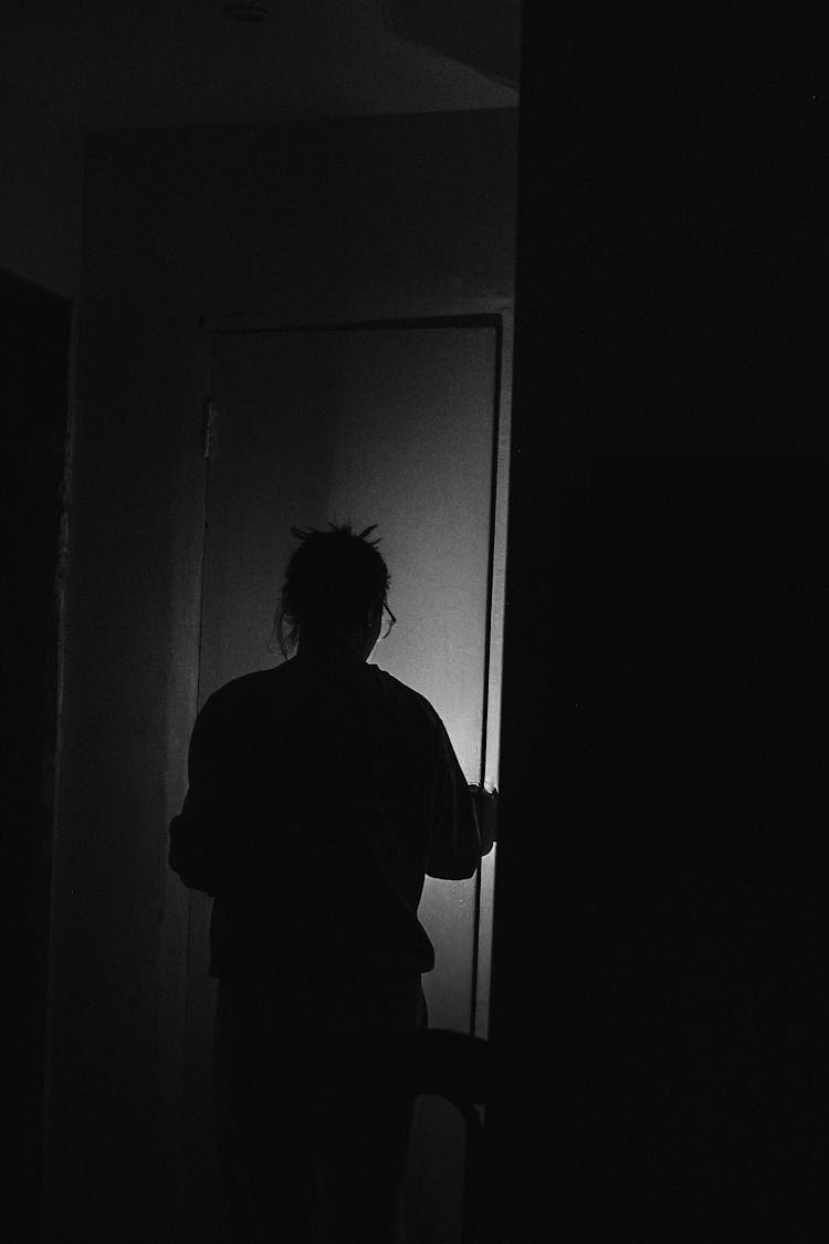 Person In A Dark Room 