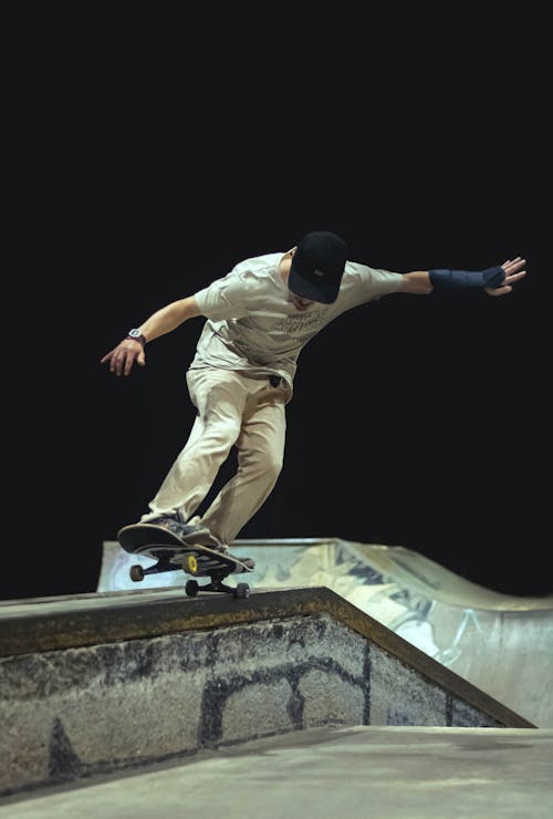Man Doing Tricks on a Skateboard 