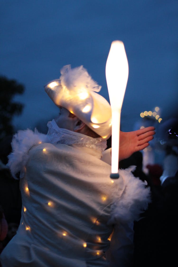 Man Wearing Illuminated Lights On Costume