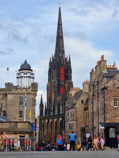 Free The Hub's gothic spire towering over Edinburgh's vibrant cityscape. Stock Photo