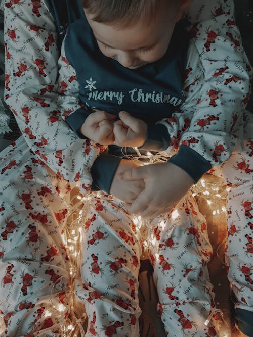 Free Children in Matching Christmas Pajamas Stock Photo