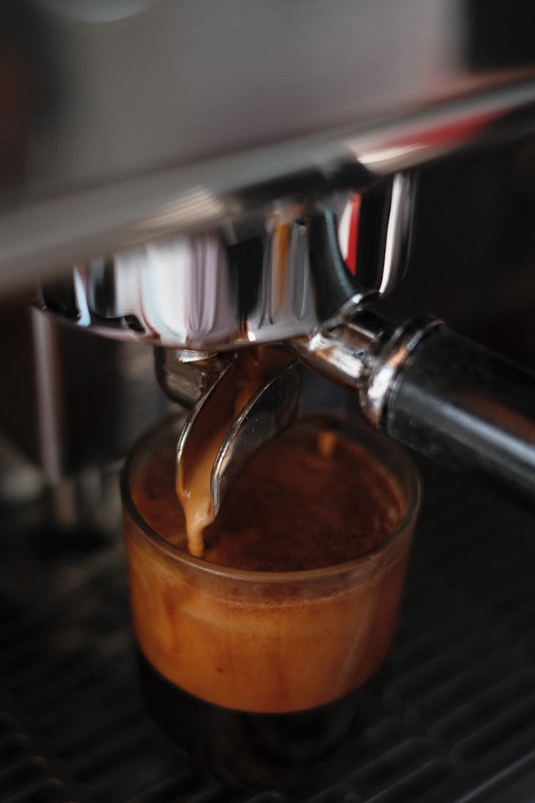 Coffee Pouring Into A Cup