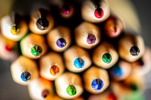 A close-up image of vibrant colored pencils showcasing their tips in detailed focus.