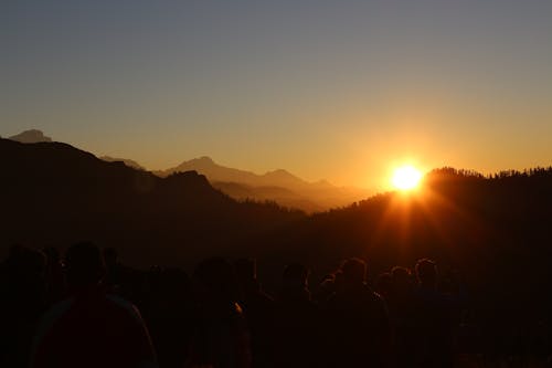 Silhouette of Mountain by the Setting of Sun