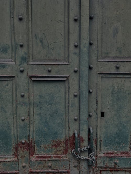 Free Metal Door with Chain and Padlock Stock Photo