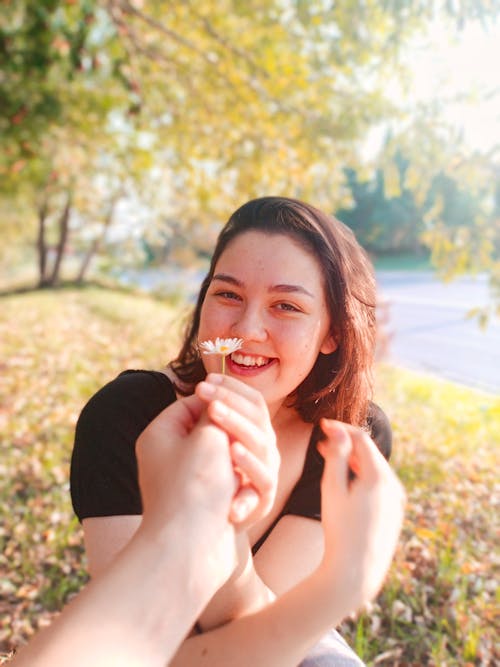 
Giving Flower to a Girl