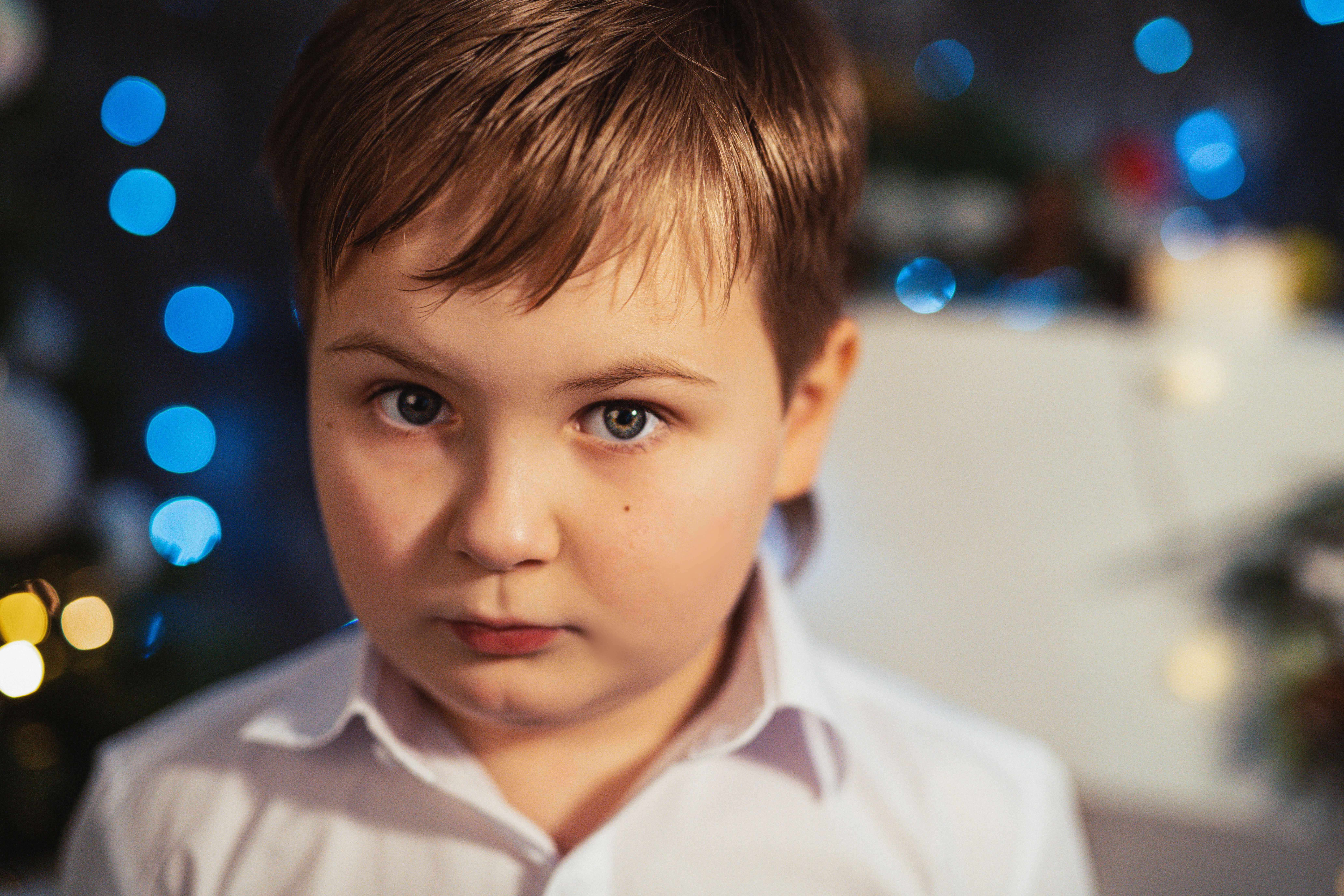 A Cute Little Boy Seriously Looking at the Camera · Free Stock Photo