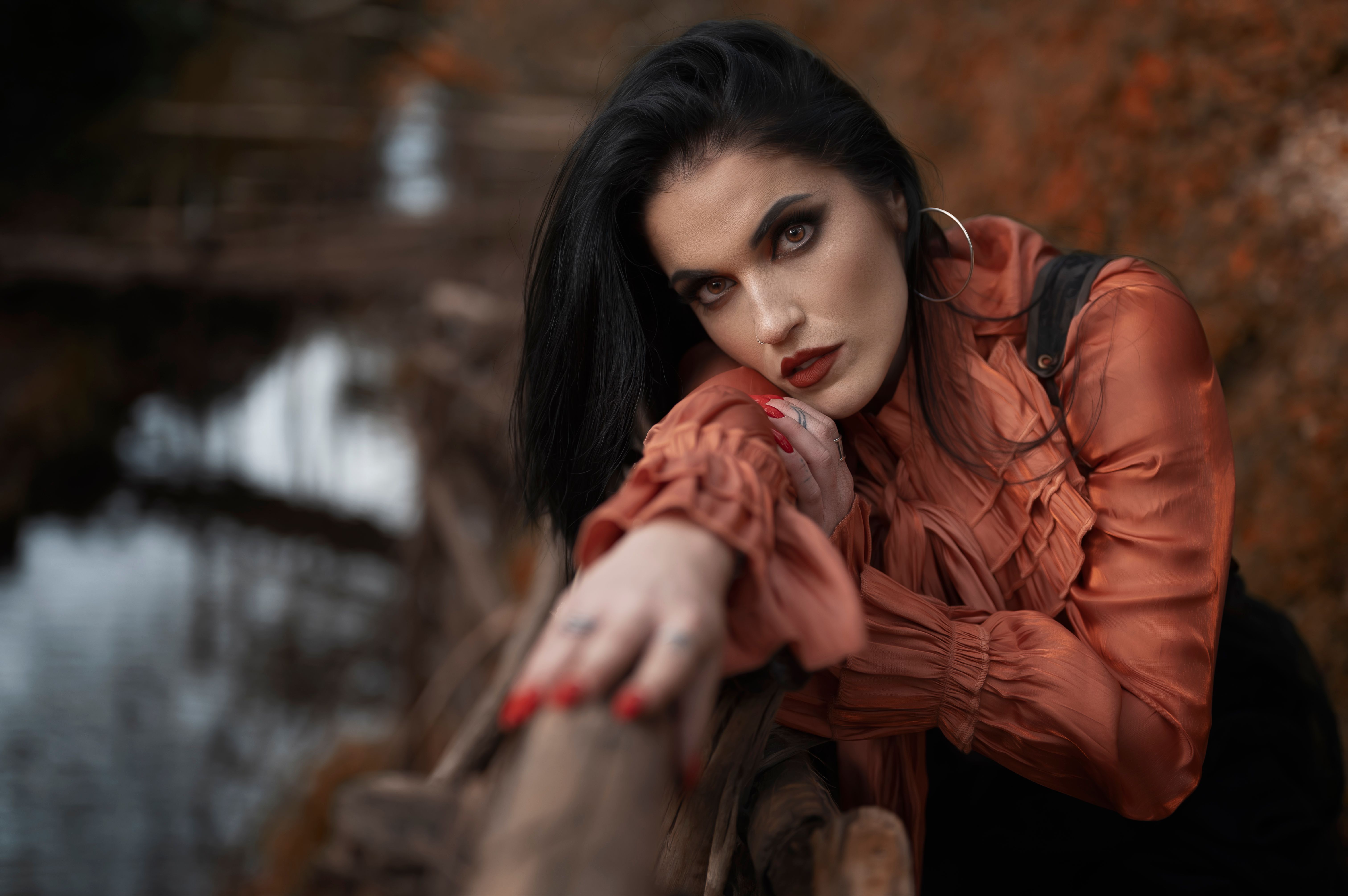 A Beautiful Woman Seriously Looking at the Camera · Free Stock Photo