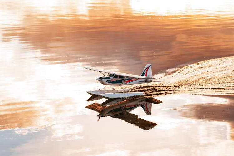 A Toy Seaplane On Water