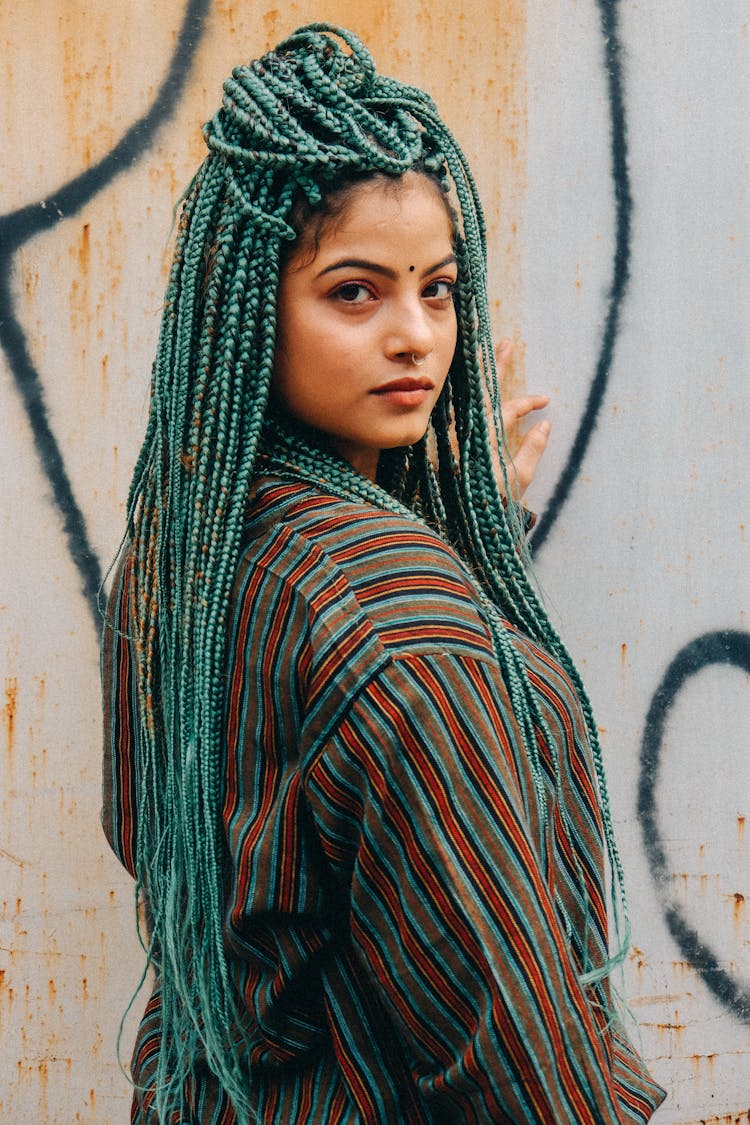 Young Woman With Many Long Green Coloured Braids