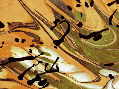 Dynamic abstract paint swirl featuring green and orange tones with bold black accents.