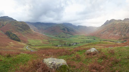 Mountains under the Cloudy Sky