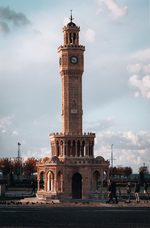 Free Landscape shot of the iconic İzmir Clock Tower in Konak Square, Turkey at daytime. Stock Photo