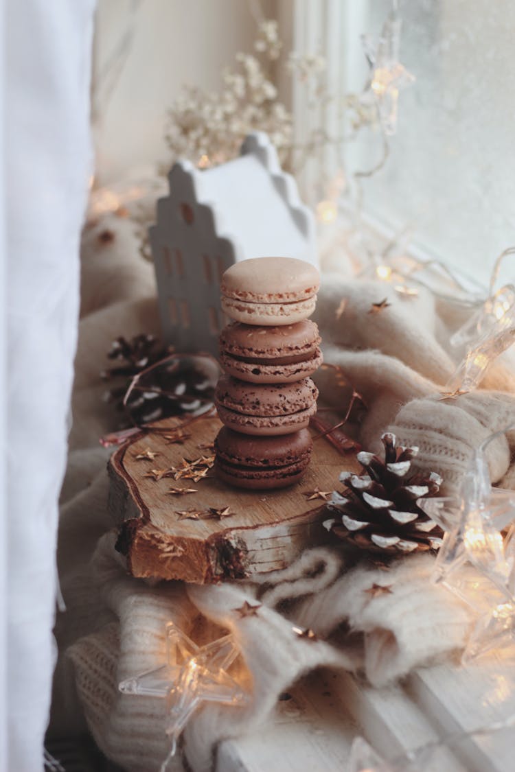 Macaroons And Winter Decoration On The Windowsill