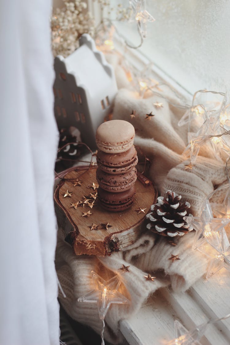 Macaroons And Winter Decoration On The Windowsill