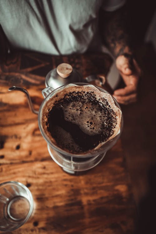 Person Brewing Coffee