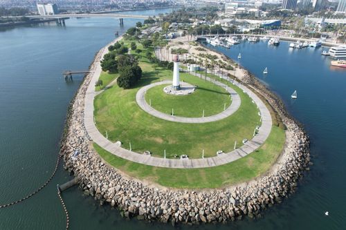 Free Drone shot of Lion Lighthouse in Shoreline Aquatic Park, Long Beach. Stock Photo