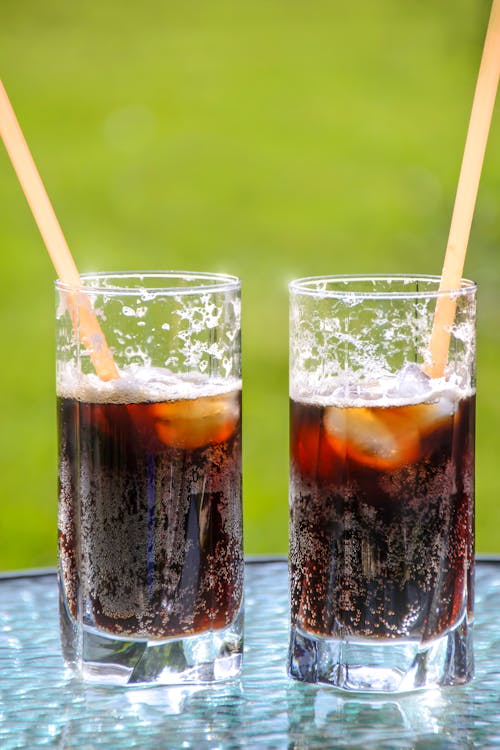 Free Two Glasses With Beverage and Straws Stock Photo