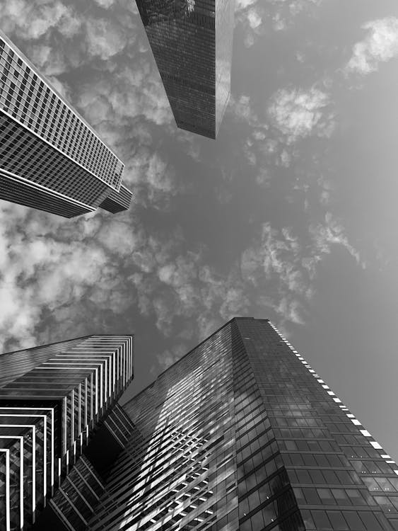 Grayscale Photo of High Rise Buildings · Free Stock Photo