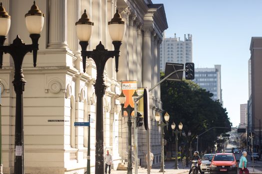 Urban street view in Curitiba's Centro, showcasing classic architecture and vibrant city life.