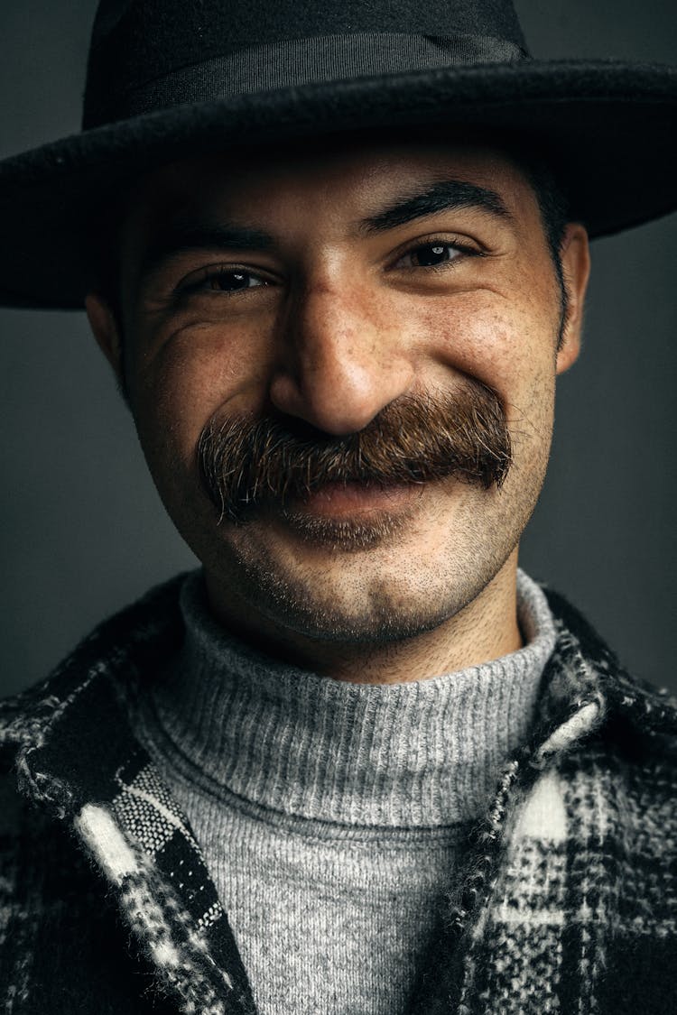 Portrait Of A Man With Hat And Moustache