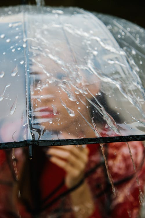 Woman Under a Clear Umbrella