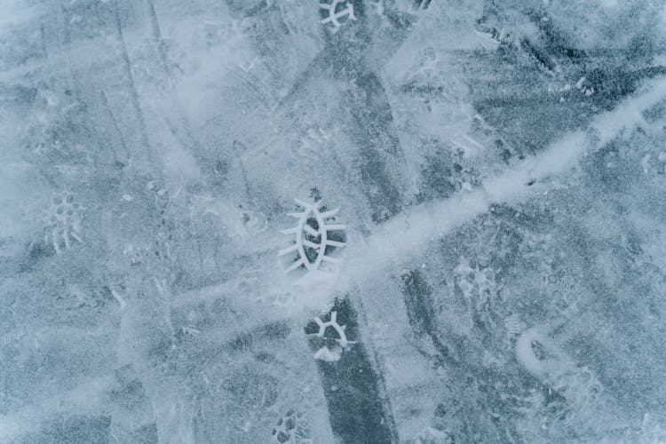 Footsteps On Frozen River