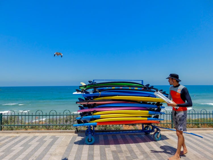 Stacked Surfboards On A Cart