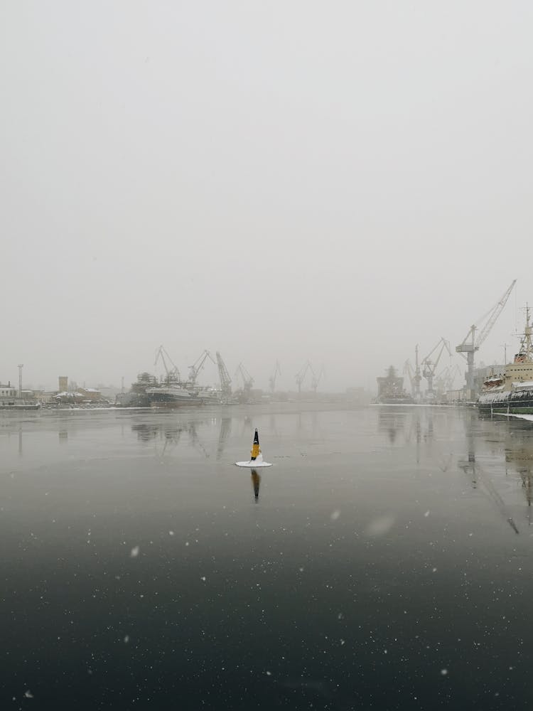 Small Ship Sailing In Water