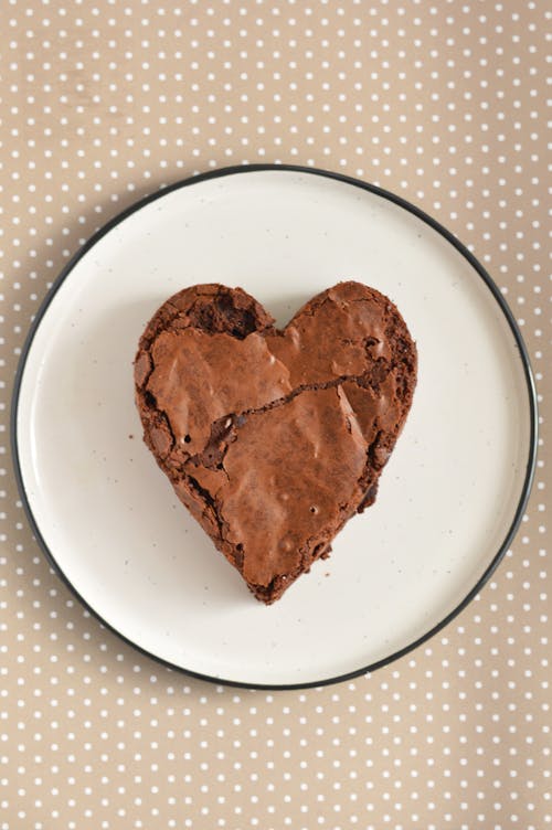 Heart Shaped Chocolate Cake on a Round Plate