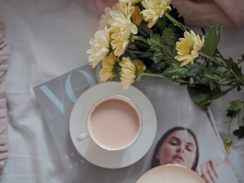 A Cup of Coffee and a Magazine 