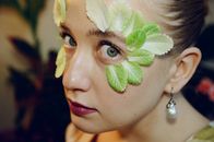 Leaves on a Woman's Face