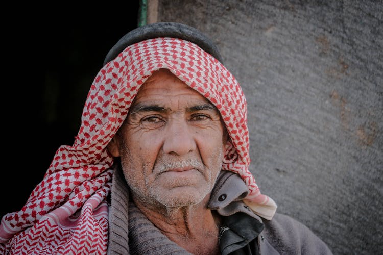 Man In Red And White Plaid Head Scarf