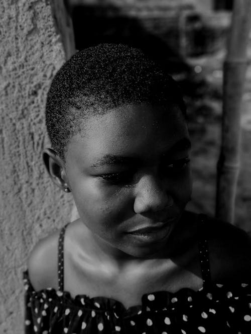 Grayscale Photo of Girl with Short Hair