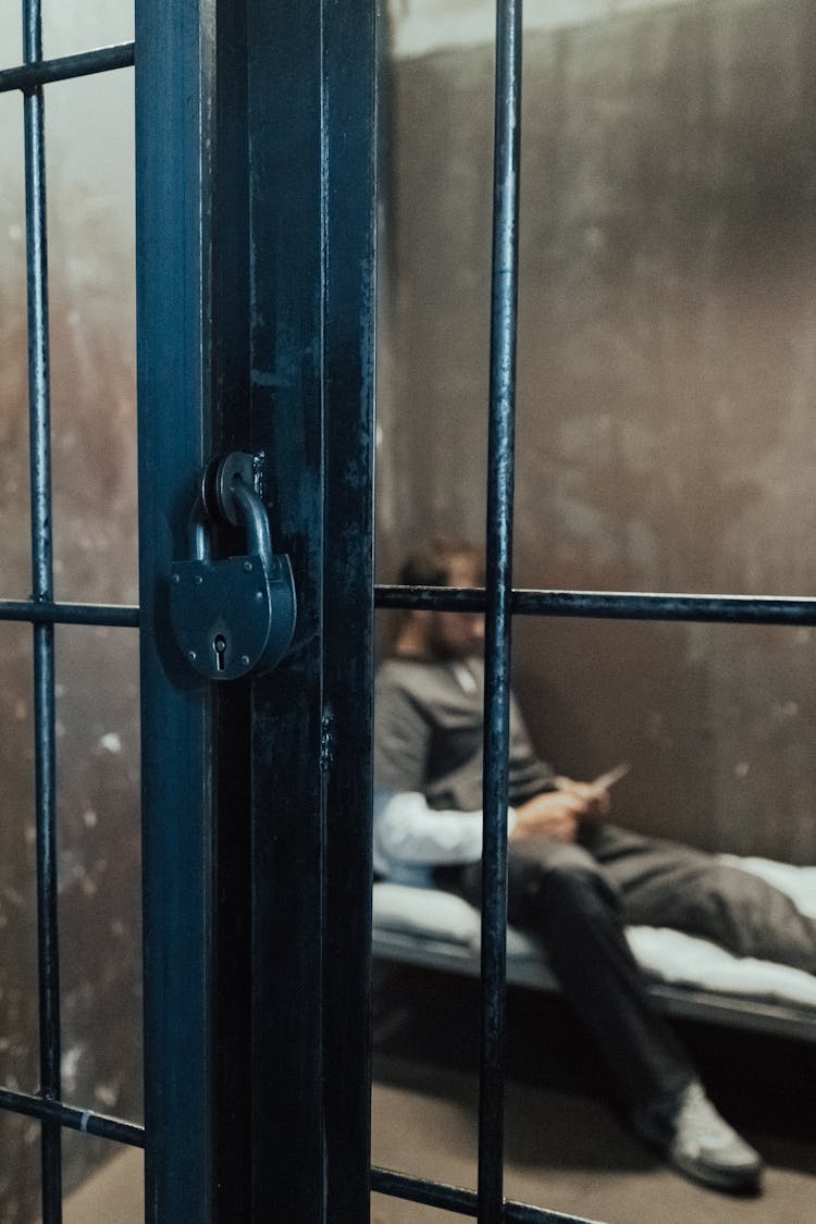 A Man Inside A Jail