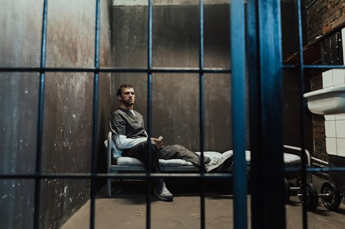 Gratis lagerfoto af celle, fængselsuniform, fange Lagerfoto