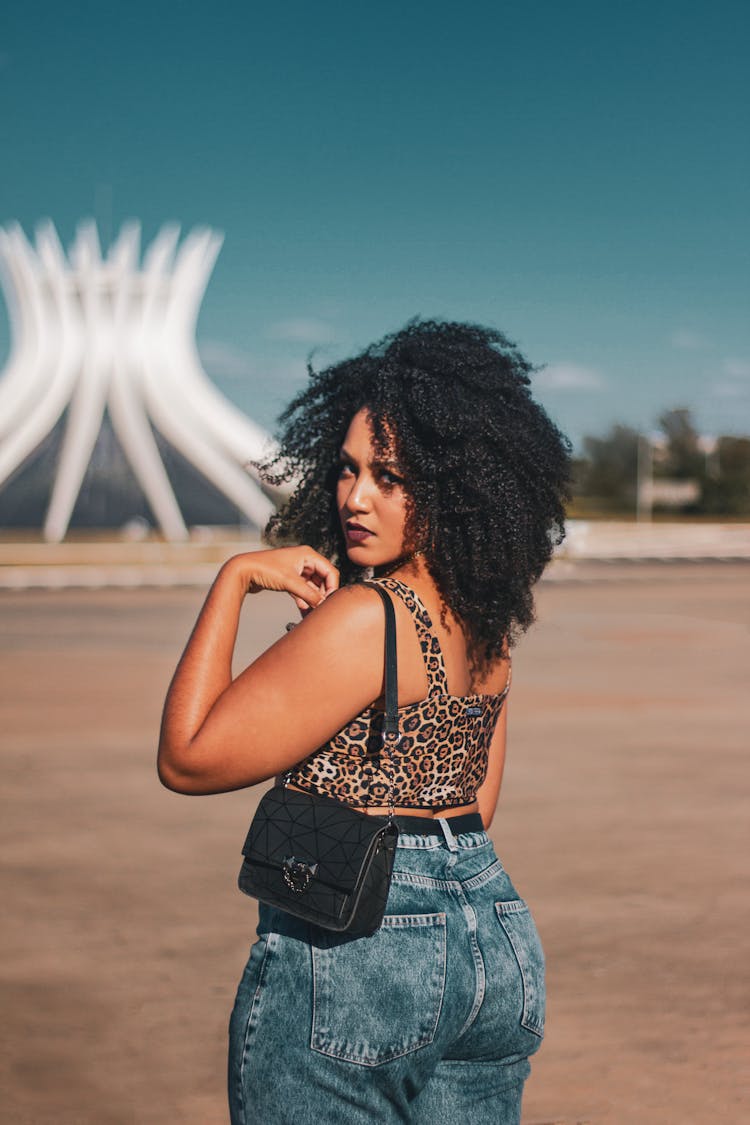 Woman Wearing Leopard Print Top Looking Back