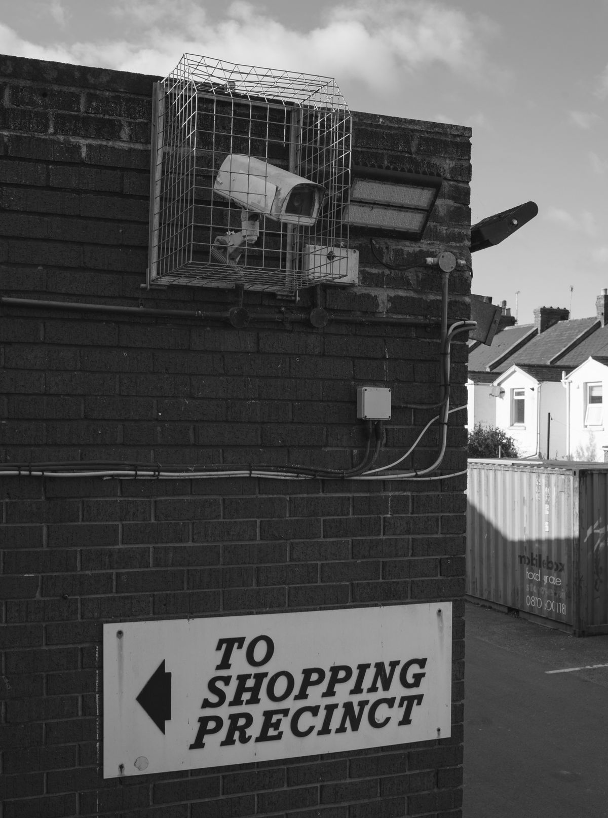 CCTV camera mounted on the exterior of a brick building in the United Kingdom
