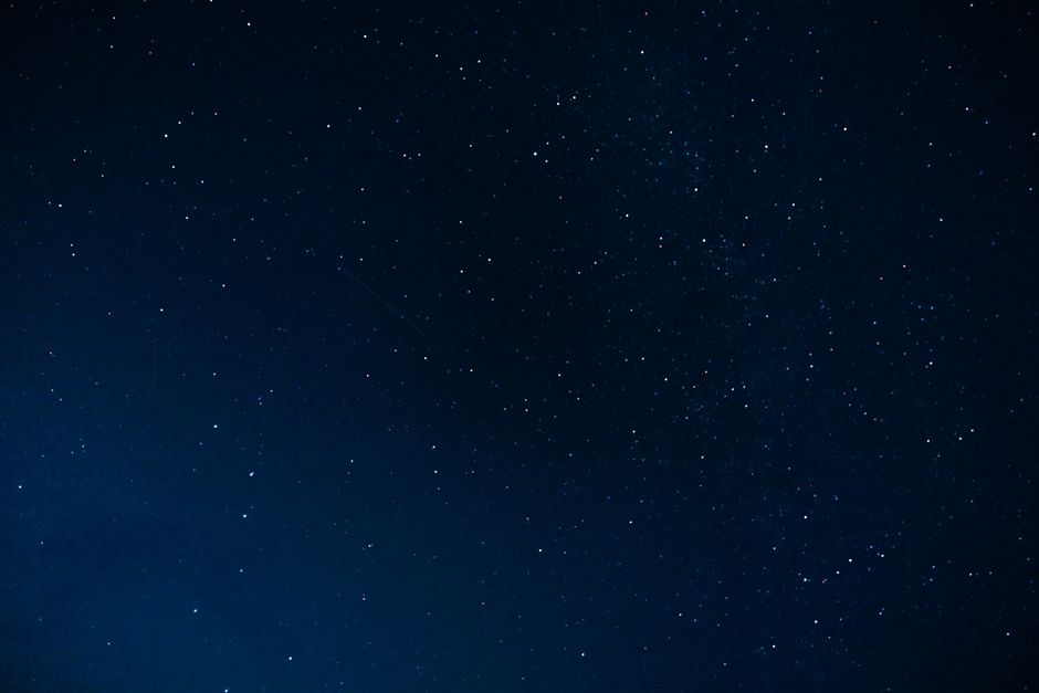 A captivating view of a star-studded night sky, showcasing constellations in the vast darkness.