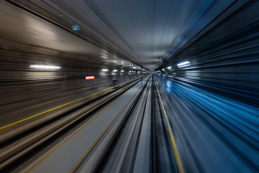 Capture of speed and motion blur in a Moscow Metro tunnel, showcasing urban transit dynamics.