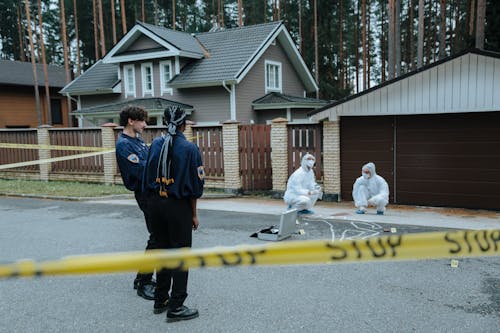 People Standing on the Crime Scene