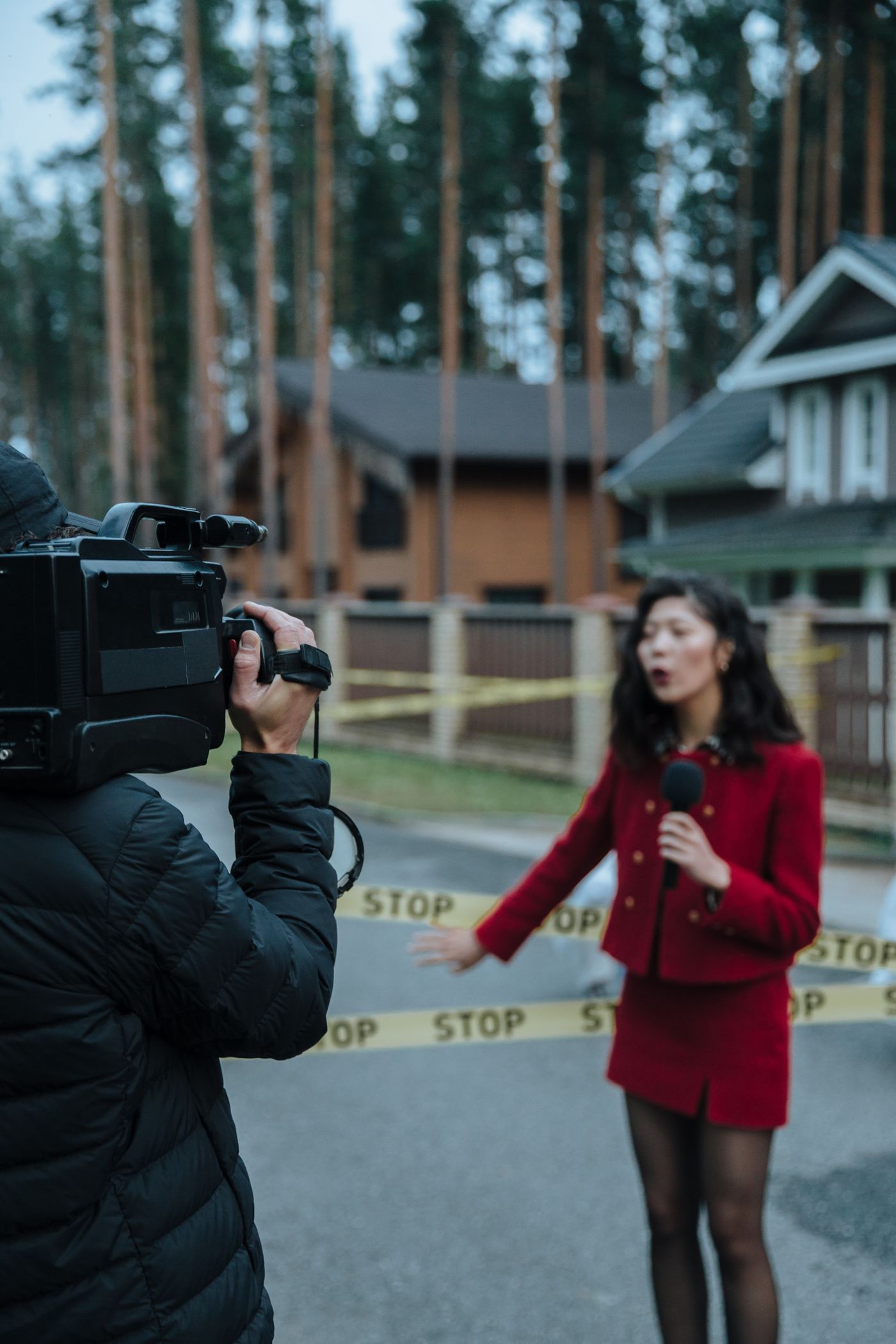 Reporter and cameraman reporting live on a street