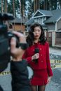 Woman in Red Sweater Smiling