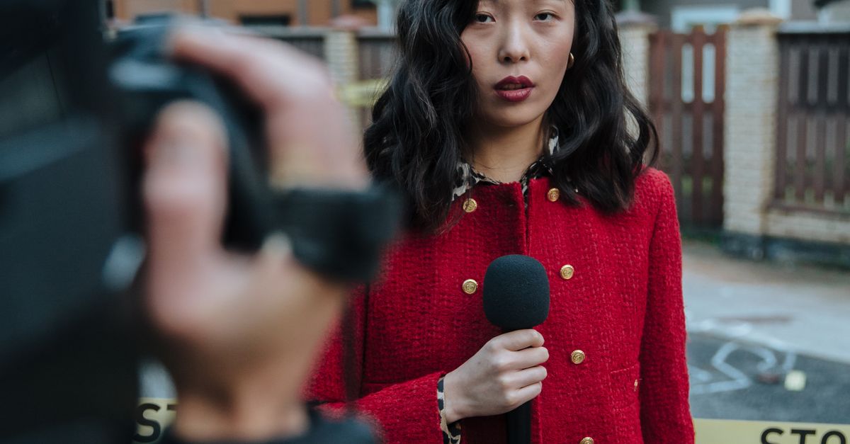 Reportingly Photos Woman Reporting on Camera · Free Stock Photo